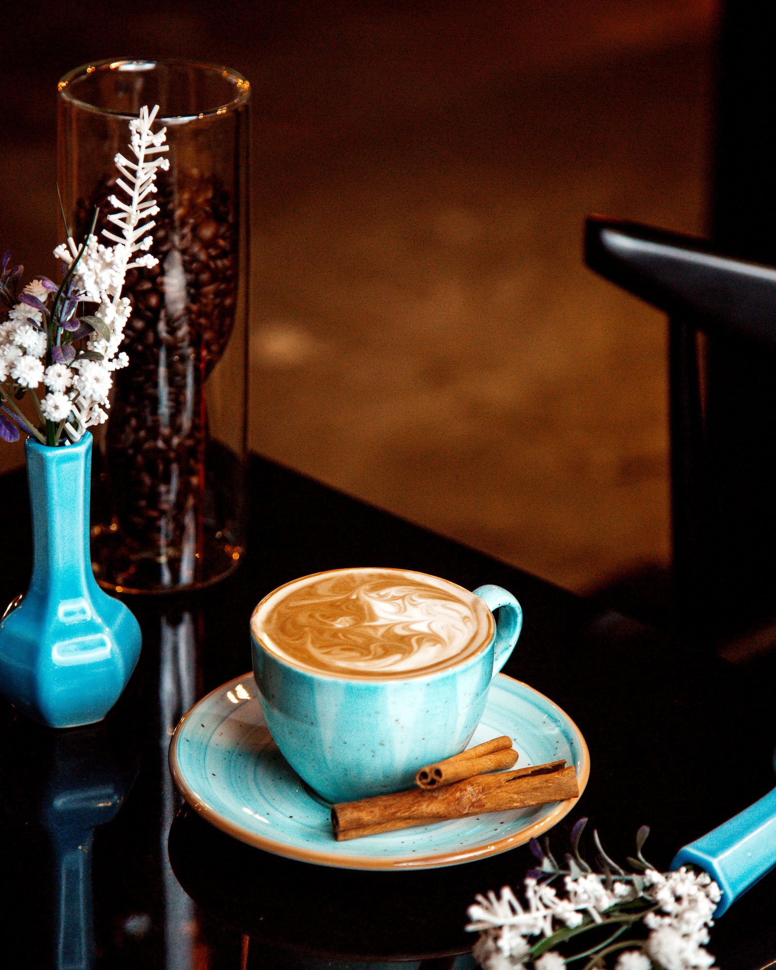 A well-composed shot of a bustling cafe interior, highlighting the harmony between customers and the environment
